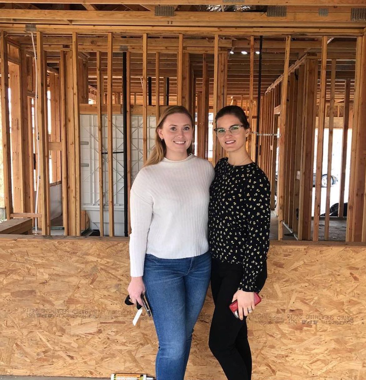 Client touring her new-construction starter home